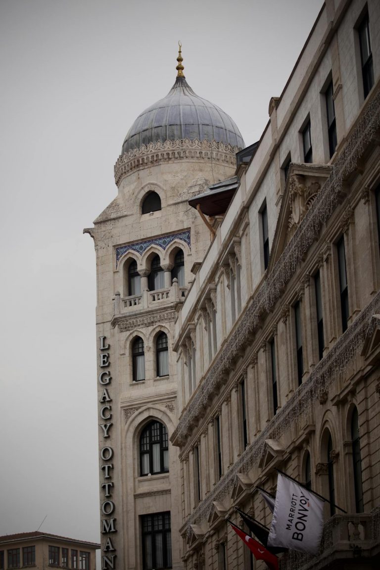 A beautiful example of Ottoman architectural style with ornate detailing in an urban setting.