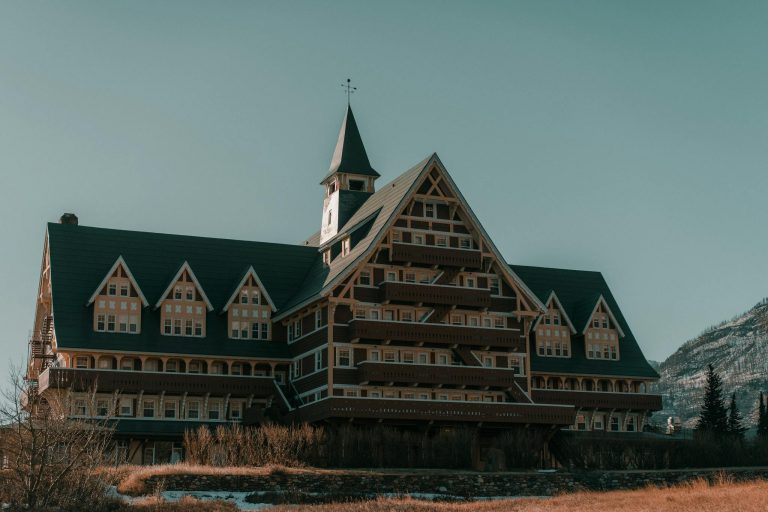 The Prince of Wales Hotel against a mountainous backdrop in Waterton Lakes National Park.